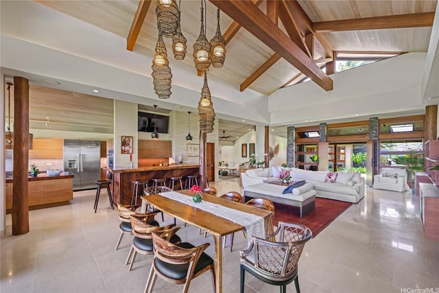 376 Dune Cir, Kailua, HI 96734 - dining space featuring high vaulted ceiling, beamed ceiling, light tile patterned floors, and a bar