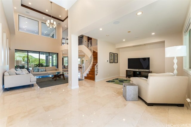 living room with marble finish floor, recessed lighting, stairway, a chandelier, and baseboards