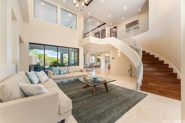 living room with baseboards, stairway, recessed lighting, and a notable chandelier