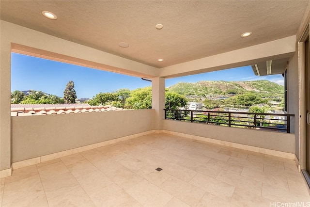 view of patio with a balcony