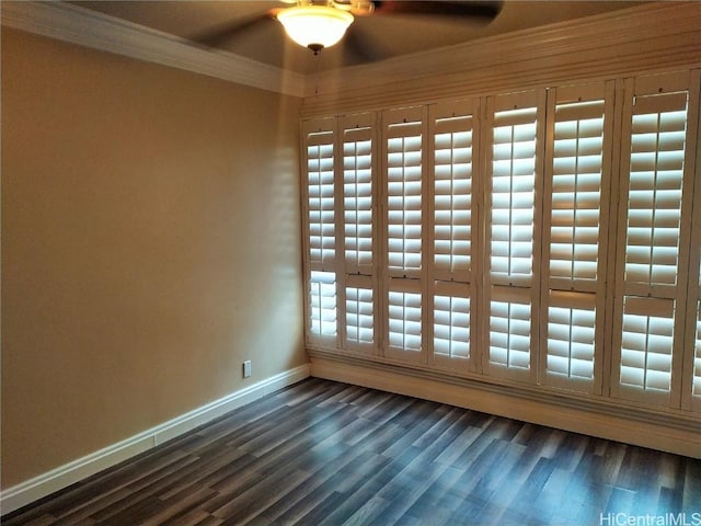 unfurnished room featuring ceiling fan, crown molding, baseboards, and dark wood-type flooring