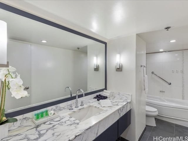 full bath featuring bathing tub / shower combination, recessed lighting, toilet, vanity, and tile patterned flooring