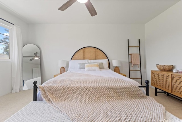 bedroom with carpet flooring and a ceiling fan