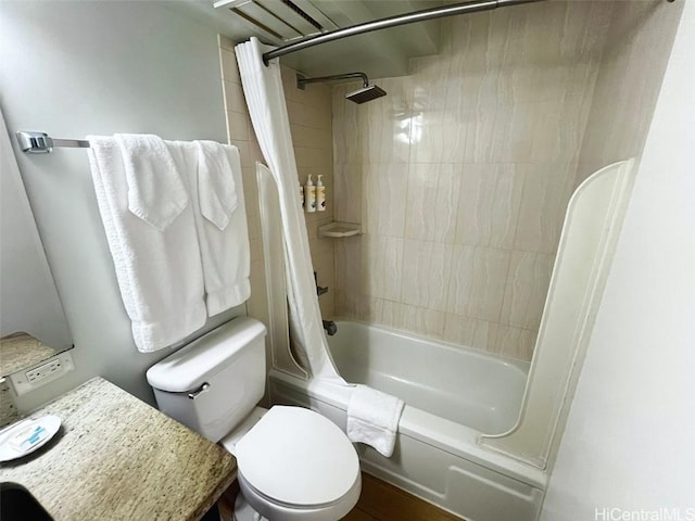 bathroom with shower / bath combo with shower curtain and toilet