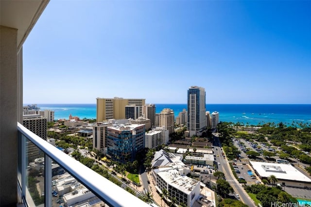 exterior space featuring a view of city and a water view