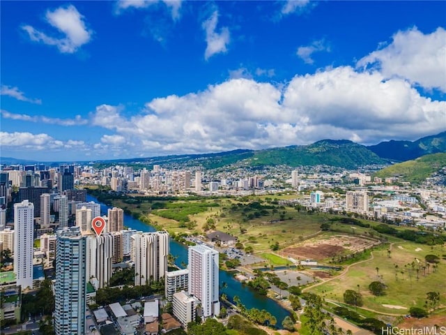 aerial view with a view of city and a water and mountain view