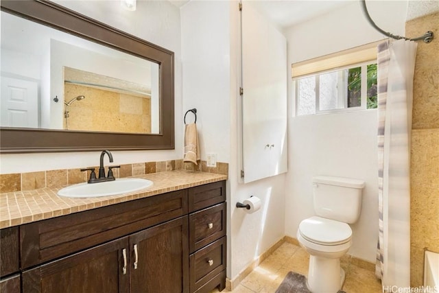 full bath with tile patterned flooring, toilet, a shower with shower curtain, vanity, and baseboards