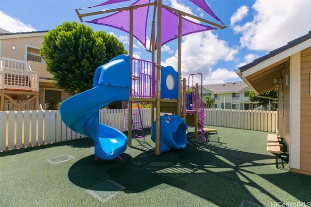 community playground featuring fence