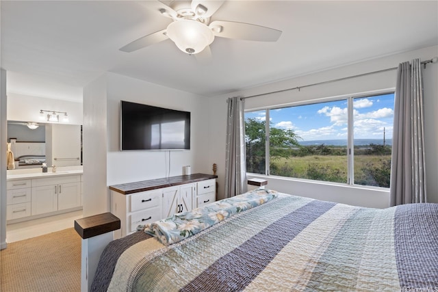 91-418 Makalea St Unit 92, Ewa Beach, HI 96706 - bedroom with a sink, ensuite bathroom, and ceiling fan