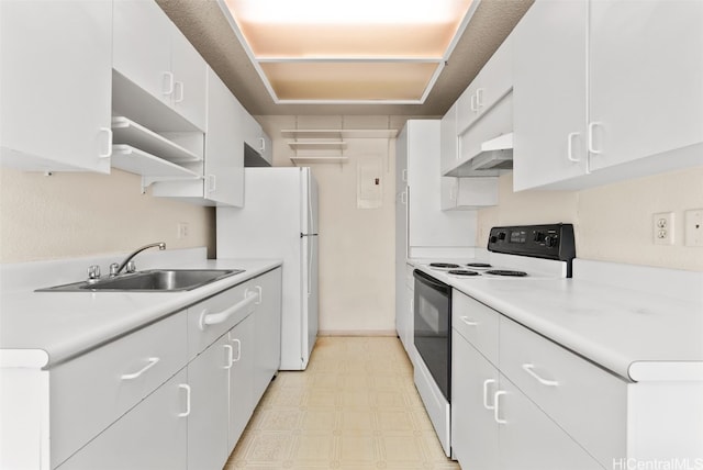 kitchen featuring light floors, light countertops, a sink, white appliances, and under cabinet range hood