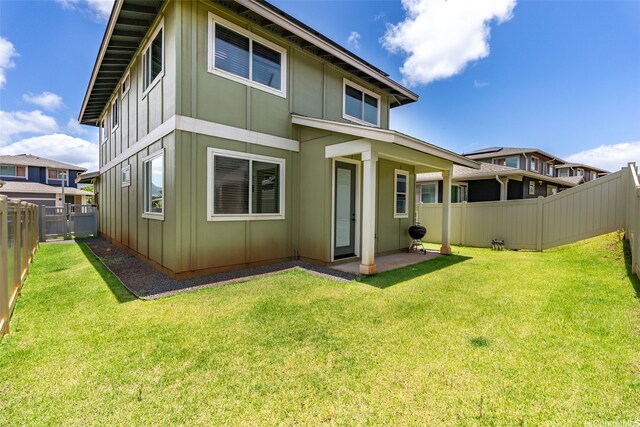 94-1251 Hale Halawai Dr Unit 6, Waipahu, HI 96797 - back of house featuring board and batten siding