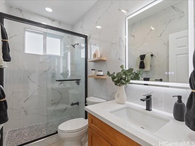 full bath featuring toilet, tasteful backsplash, a marble finish shower, tile walls, and vanity