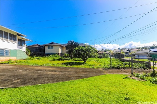 view of yard with fence