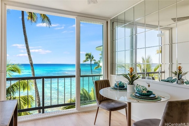 sunroom with a water view