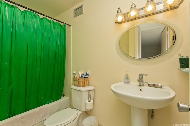 2714 Kahoaloha Ln Unit 503, Honolulu, HI 96826 - bathroom featuring shower / bath combo with shower curtain and toilet
