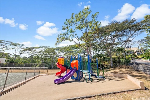 community jungle gym with fence