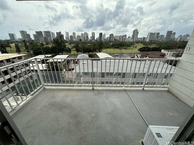 balcony featuring a view of city