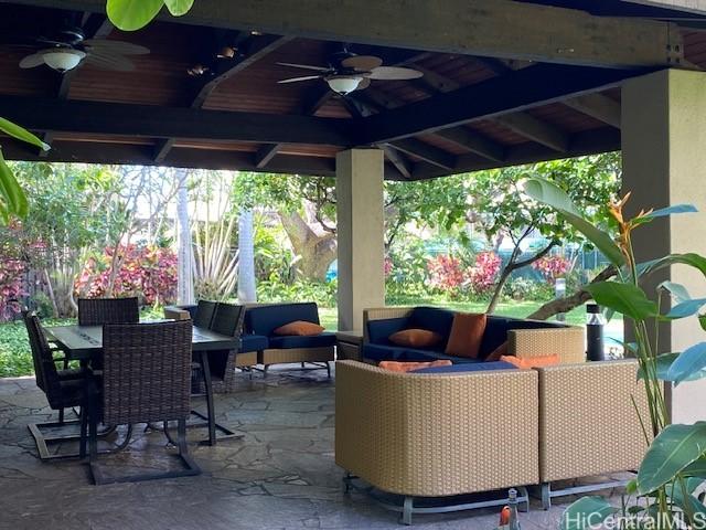 view of patio / terrace featuring outdoor dining space, outdoor lounge area, and a ceiling fan