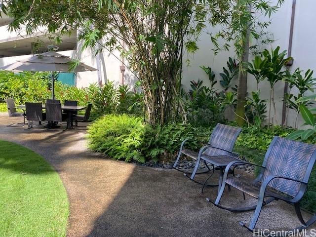 exterior space featuring outdoor dining area and a patio