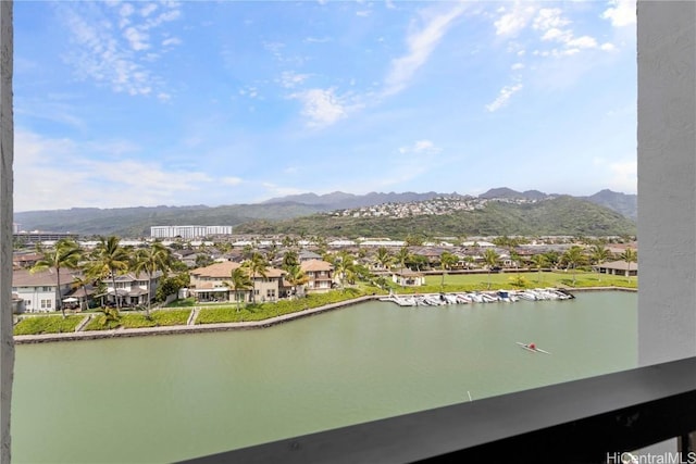 water view featuring a residential view and a mountain view