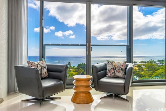 living area with a water view