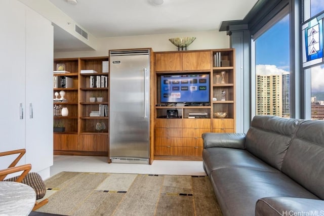 living area featuring visible vents