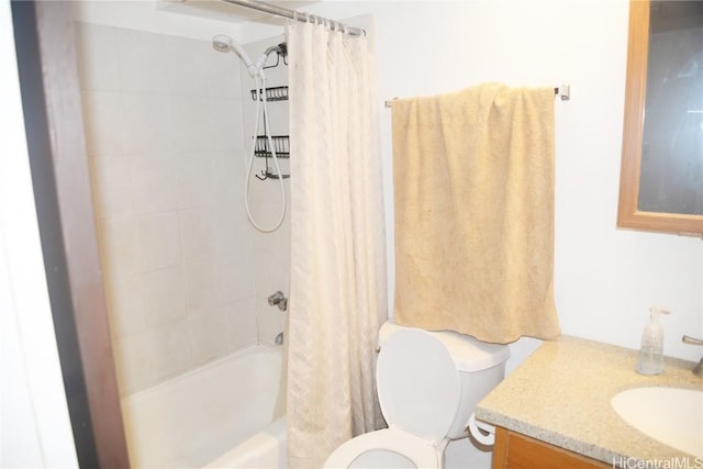 bathroom with shower / tub combo with curtain, vanity, and toilet