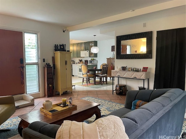 living area featuring light tile patterned flooring