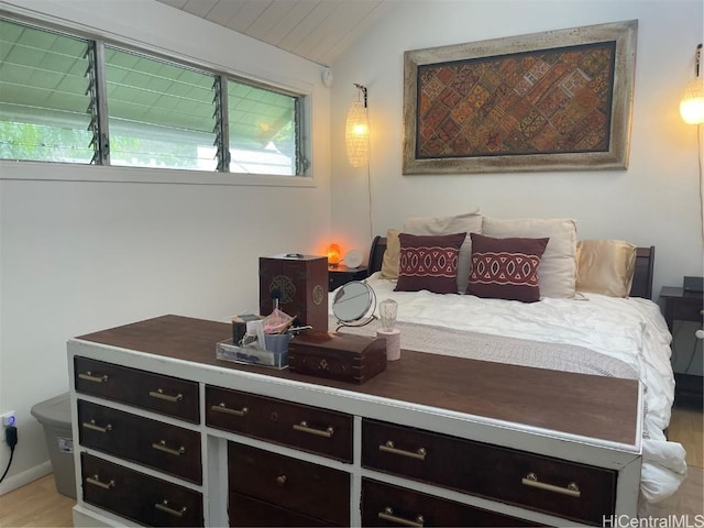 bedroom featuring vaulted ceiling