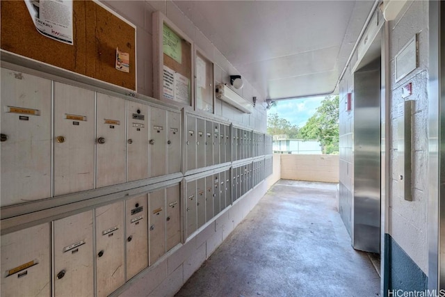 hallway featuring mail area