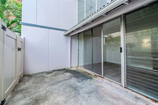 view of patio / terrace featuring fence