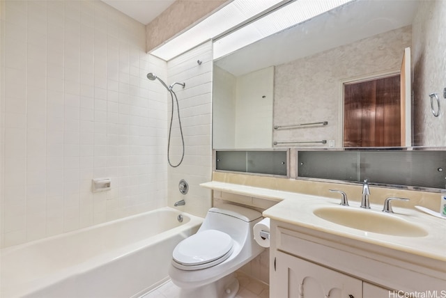 bathroom with vanity, toilet, and bathing tub / shower combination