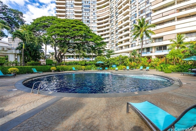 pool with a patio