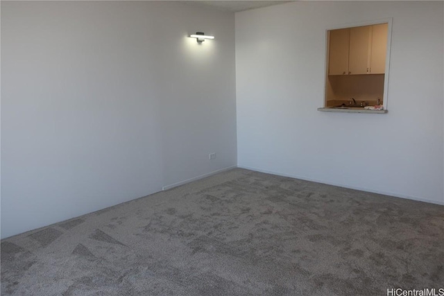 spare room with carpet flooring