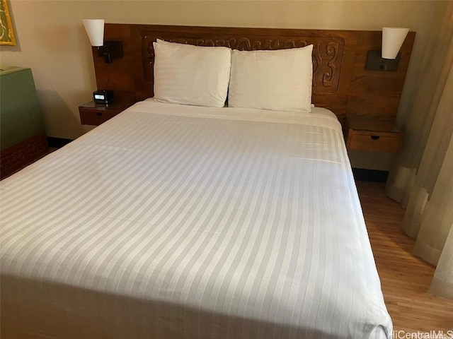 bedroom featuring light wood-style floors