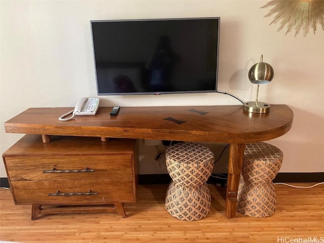 details with wood finished floors and baseboards