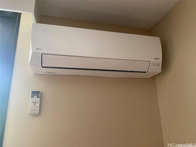 interior details featuring a wall unit AC