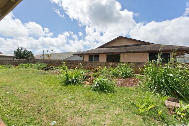 view of yard featuring fence