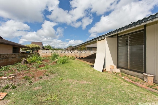 view of yard with fence