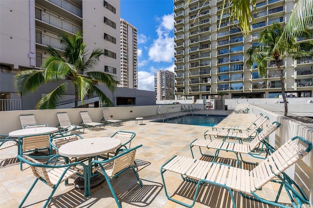 2440 Kuhio Ave Unit 1101, Honolulu, HI 96815 - community pool featuring a patio area