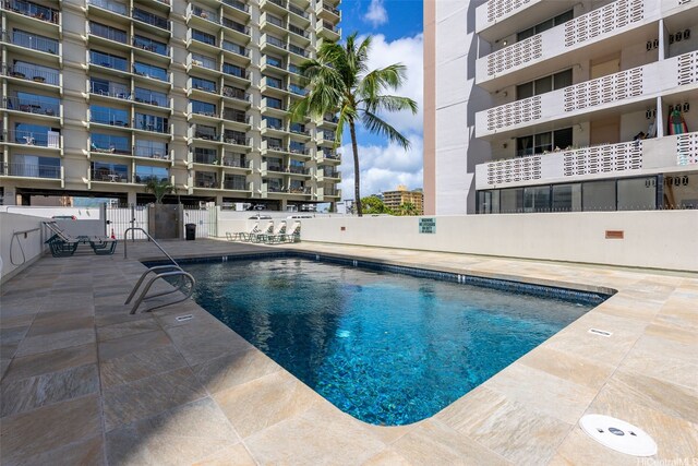 2440 Kuhio Ave Unit 1101, Honolulu, HI 96815 - community pool with a patio