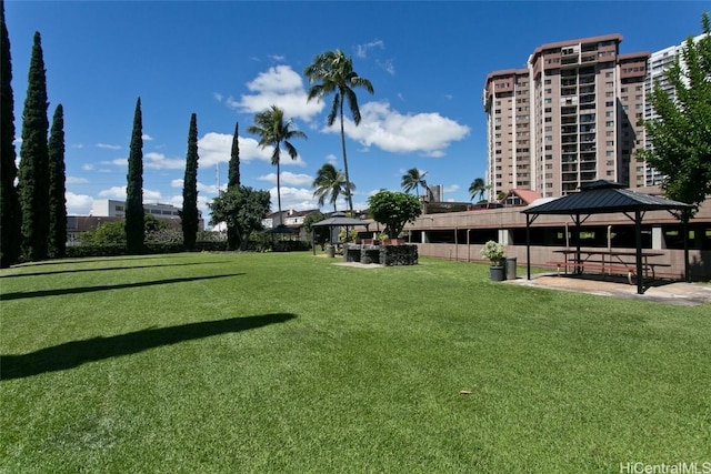 view of community with a yard and a gazebo