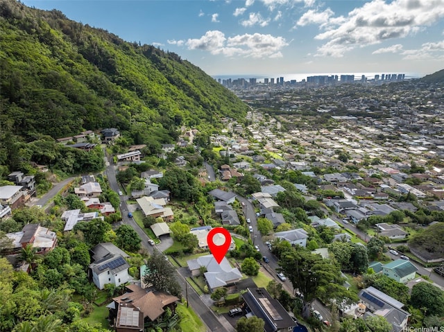 birds eye view of property featuring a city view
