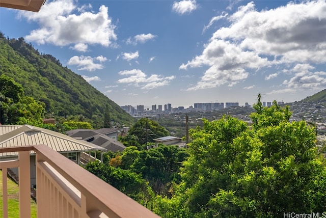 property view of mountains featuring a city view