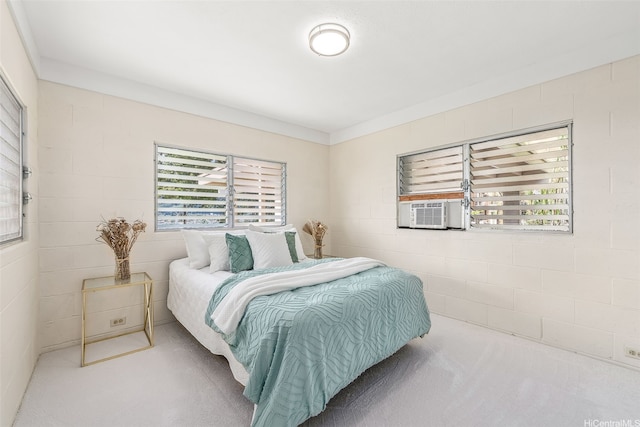 carpeted bedroom with cooling unit
