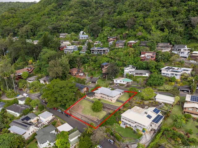 birds eye view of property with a residential view and a forest view