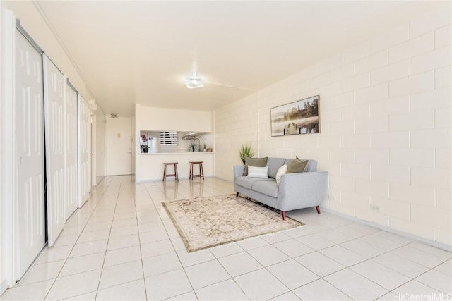 living room featuring light tile patterned flooring