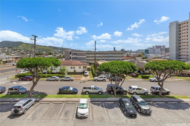 exterior space featuring a view of city and uncovered parking