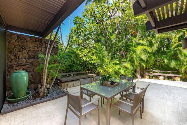 view of patio featuring outdoor dining space