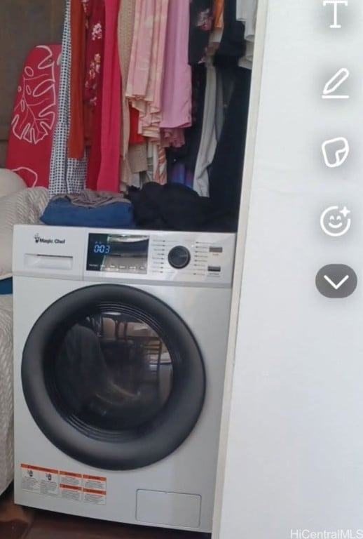 laundry area with washer / dryer and laundry area